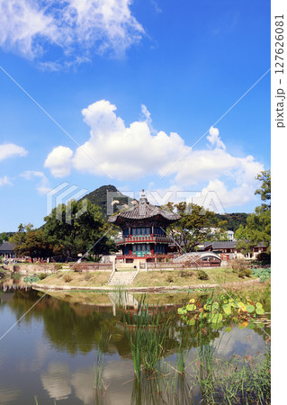 Landscape with ancient pavilion, mountains and lake. Hyangwonjeong Pavilion in the pond, garden of Gyeongbokgung palace, Seoul, South Korea. Topic of travel, trip abroad on vacation, cruises and tours Landscape with ancient pavilion, mountains and lake. Hyangwonjeong Pavilion in the pond, garden of Gyeongbokgung palace, Seoul, South Korea. Topic of travel, trip abroad on vacation, cruises and tours 127626081