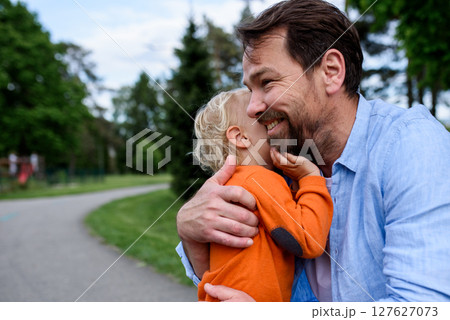 Portrait of dad and child enjoying time together 127627073