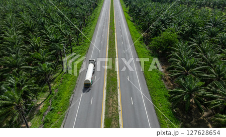 Aerial view cargo truck on highway logistic cargo transport, Semi truck trailer on highway cargo transport supply chain freight distrtibution, Global business logistic transport truck cargo freight. 127628654
