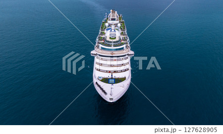 Aerial view luxury ocean cruise ship on clam blue sea, Elegant modern travel lifestyle, Luxury cruise ship liner modern maritime business ocean tourism, Global business cruise ship liner industry. 127628905