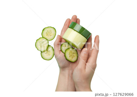 Hands with cucumber moisturizer jar, isolated on white, PNG 127629066