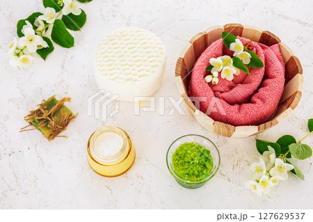 Spa products for facial and body care with soft terry towel. 127629537