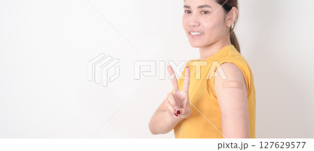 Adult Woman with bandage after received vaccine. Vaccination and Immunization for Influenza, HPV, Zoster, IPD, DTP or Diphtheria, Tetanus and Pertussis, MMR, Hepatitis B, Covid and Varicella vaccine Adult Woman with bandage after received vaccine. Vaccination and Immunization for Influenza, HPV, Zoster, IPD, DTP or Diphtheria, Tetanus and Pertussis, MMR, Hepatitis B, Covid and Varicella vaccine 127629577