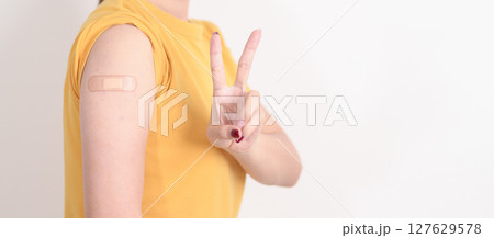 Adult Woman with bandage after received vaccine. Vaccination and Immunization for Influenza, HPV, Zoster, IPD, DTP or Diphtheria, Tetanus and Pertussis, MMR, Hepatitis B, Covid and Varicella vaccine Adult Woman with bandage after received vaccine. Vaccination and Immunization for Influenza, HPV, Zoster, IPD, DTP or Diphtheria, Tetanus and Pertussis, MMR, Hepatitis B, Covid and Varicella vaccine 127629578