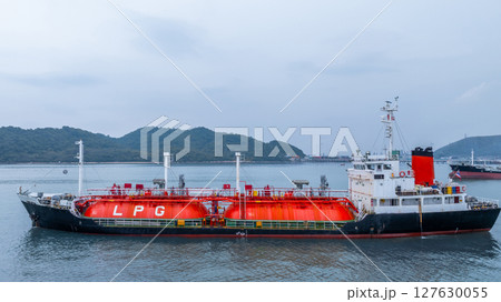 Aerial view LPG gas tanker ship on deep blue sea, Global business freight shipping import export logistic transportation oil and gas product tanker ship, Liquefied Petroleum Gas LPG tanker ship in sea 127630055