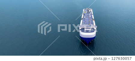 Aerial view RoRo Ship business logistic and transportation sea freight, Cargo and RoRo ship Roll On Roll Off ship at sea, Car carrier ship RO-RO Roll on Roll off. Aerial view RoRo Ship business logistic and transportation sea freight, Cargo and RoRo ship Roll On Roll Off ship at sea, Car carrier ship RO-RO Roll on Roll off. 127630057
