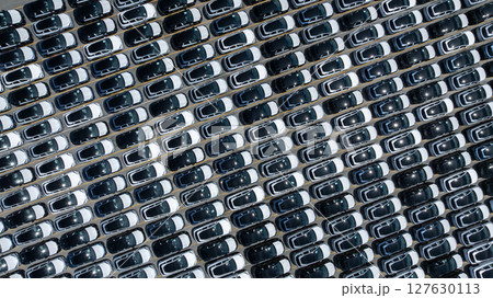 Aerial view of new ev cars stock at ro ro terminal international port, Aerial view of new ev cars stock at ro ro terminal international port, 127630113