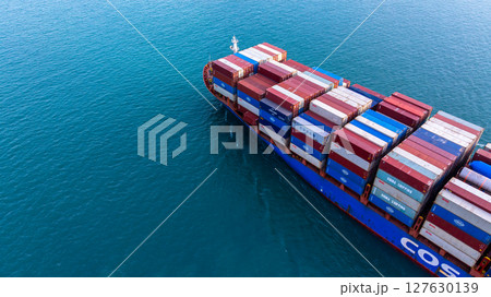 Aerial view container cargo ship freight shipping international, Global business freight shipping import export logistic transportation container ship, Container cargo ship sea freight container ship. Aerial view container cargo ship freight shipping international, Global business freight shipping import export logistic transportation container ship, Container cargo ship sea freight container ship. 127630139