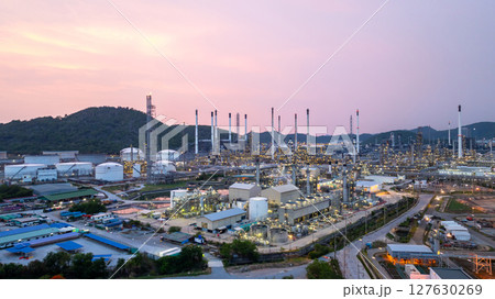 Aerial view oil and gas refinery plant at night, Global business energy logistic transportation, Oil and gas refinery petrochemical industrial, Petrochemical refinery industrial energy supply chain. 127630269