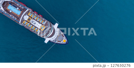Aerial view luxury ocean cruise ship with swimming pool sun deck lounge chairs on clam blue sea, Elagant modern travel lifestlye, Luxury cruise ship liner modern maritime business ocean tourism, 127630276