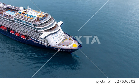 Aerial view luxury ocean cruise ship on clam blue sea, Elegant modern travel lifestyle, Luxury cruise ship liner modern maritime business ocean tourism, Global business cruise ship liner industry. 127630302