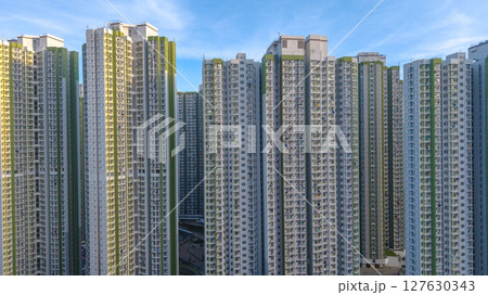 June 8 2025 Building Cluster Against a Bright Sky in Urban Setting 127630343
