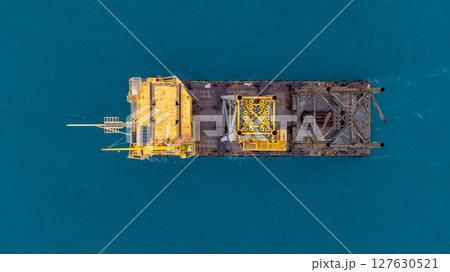 Aerial view offshore Oil and Gas production platform, Heavy duty marine engineering structure for energy and petrochemical industry, Offshore oil rig energy infrastructure marine engineering, Offshore Aerial view offshore Oil and Gas production platform, Heavy duty marine engineering structure for energy and petrochemical industry, Offshore oil rig energy infrastructure marine engineering, Offshore 127630521