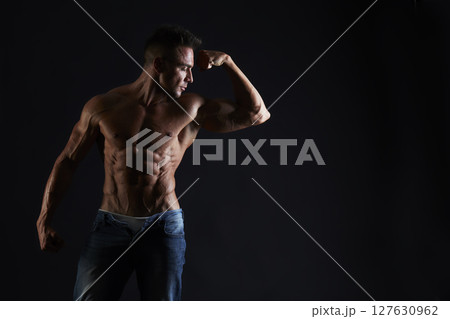 male model - fitness addicted shot in studio background 127630962