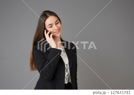 young female doctor in studio background young female doctor in studio background 127631781