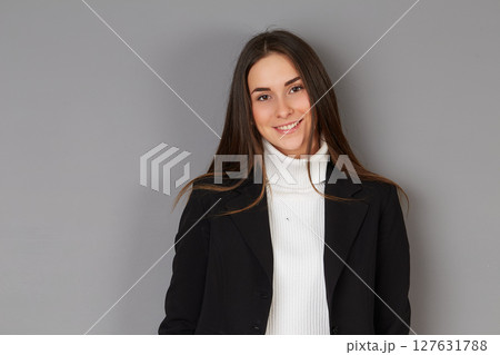 young female doctor in studio background young female doctor in studio background 127631788
