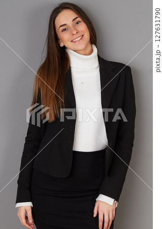 young female doctor in studio background young female doctor in studio background 127631790