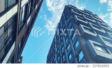 Architecture and real estate, modern residential apartment building with large panoramic windows Architecture and real estate, modern residential apartment building with large panoramic windows 127632055