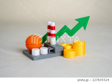 Industrial plant with stacks of money coins and green arrow pointing up. Chemical production income. Industrial plant with stacks of money coins and green arrow pointing up. Chemical production income. 127635524