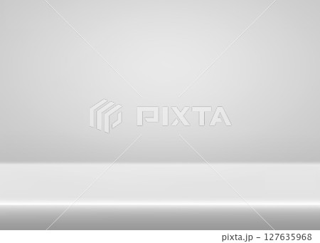 Professional limbo studio space - empty background with light grey gradient bg. Clean minimal gray backdrop for photography projects, product displays or digital designs. Smooth light transition. 127635968