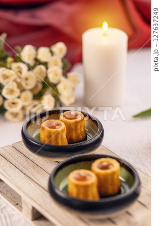 Small cakes with caramel filling 127637249