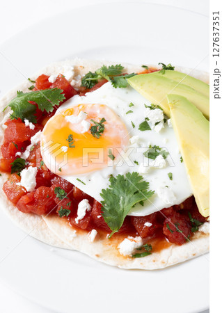 Huevos Rancheros. Traditional Mexican breakfast. 127637351