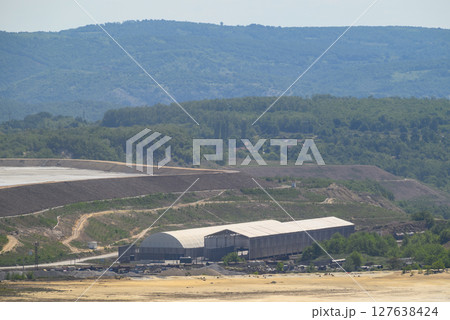 Heaps of tailings and mine dumps in Bor, Eastern Serbia, copper mine owned by Chinese mining company Zijin Mining Group Heaps of tailings and mine dumps in Bor, Eastern Serbia, copper mine owned by Chinese mining company Zijin Mining Group 127638424