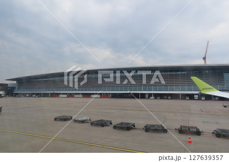 Zurich Airport building viewed from the aircraft on a cloudy day on May 8, 2025 Zurich Airport building viewed from the aircraft on a cloudy day on May 8, 2025 127639357