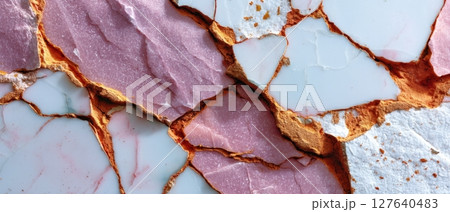 Semiprecious stone composite with ochre fractures and lilac-pink surfaces 127640483