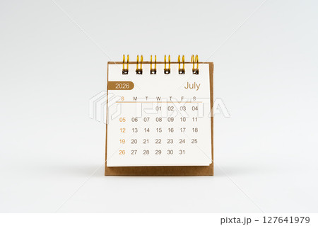 July 2026 Mini desk calendar on white background. July 2026 Mini desk calendar on white background. 127641979