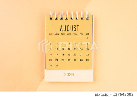 August 2026 mini desk calendar on the yellow, planning for business meeting concept. 127642092