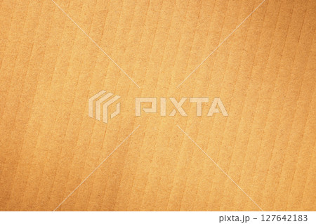 Brown packaging box kraft paper background texture with diagonal lines Brown packaging box kraft paper background texture with diagonal lines 127642183