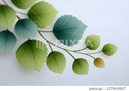 Elegant digital illustration of green and blue leaves on a white background, offering a serene and modern aesthetic. Ideal for nature-themed designs or creative decorative projects. 127642607