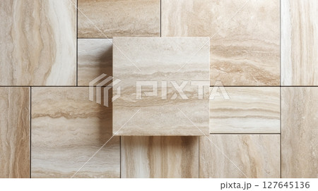 Beige travertine tiles arranged in offset rectangular layout with central tile sample 127645136