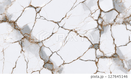 Statuario marble slab with angular golden cracks forming abstract mesh design 127645146