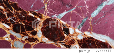 Rosso Levanto marble stone surface with vibrant mineral veins, colorful texture, abstract natural pattern, close-up view background 127645311