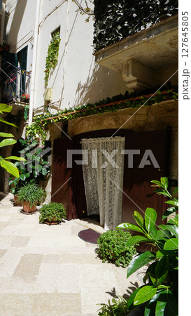 Street in old town at Bari in Apulia. Bari is the capital city of Apulia region on the Adriatic sea, in southern Italy Street in old town at Bari in Apulia. Bari is the capital city of Apulia region on the Adriatic sea, in southern Italy 127645805