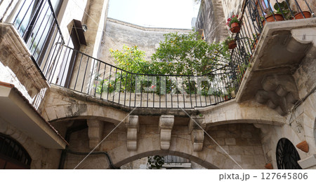 Arch in old town at Bari in Apulia. Bari is the capital city of Apulia region on the Adriatic sea, in southern Italy Arch in old town at Bari in Apulia. Bari is the capital city of Apulia region on the Adriatic sea, in southern Italy 127645806