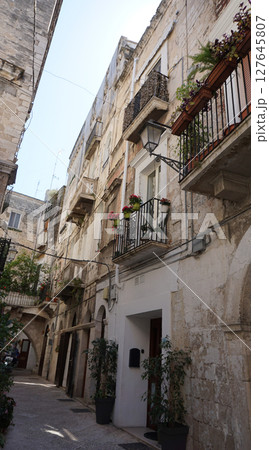 Street in old town at Bari in Apulia. Bari is the capital city of Apulia region on the Adriatic sea, in southern Italy 127645807