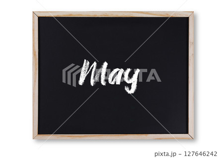 May word in chalk on chalkboard 127646242