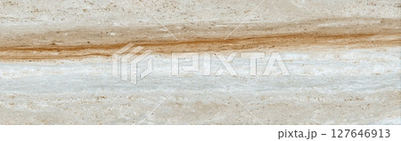 Travertine stone surface with soft brown sediment lines and porous white layers 127646913