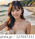 ビーチにいる水着の若い女性 127647331
