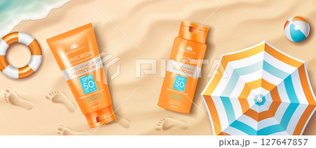 Beach scene with sunscreen and umbrella 127647857