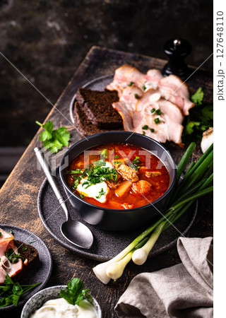 Traditional Ukrainian borsch with sour cream 127648110