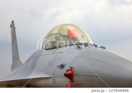 Close up F-16C fighter jet cockpit side view at airshow in Thailand. 127648466