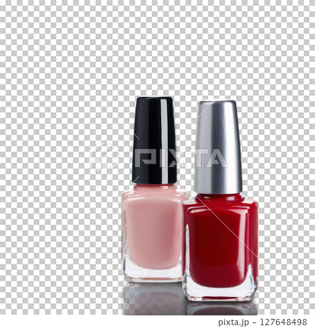Two nail polish bottles in contrasting colors set against a simple background 127648498