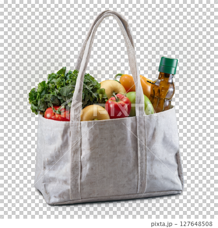 Eco-friendly shopping bag filled with fresh fruits and vegetables against a plain background 127648508