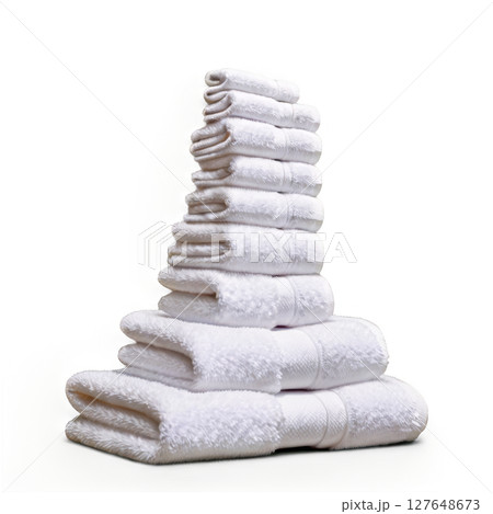 Freshly stacked white towels neatly arranged on a soft surface in a clean space Freshly stacked white towels neatly arranged on a soft surface in a clean space 127648673