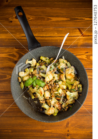 Vegetarian dish with mushrooms and spices Vegetarian dish with mushrooms and spices 127648753