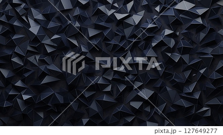 Geometric patterns form a textured wall of dark triangular shapes in a modern space 127649277